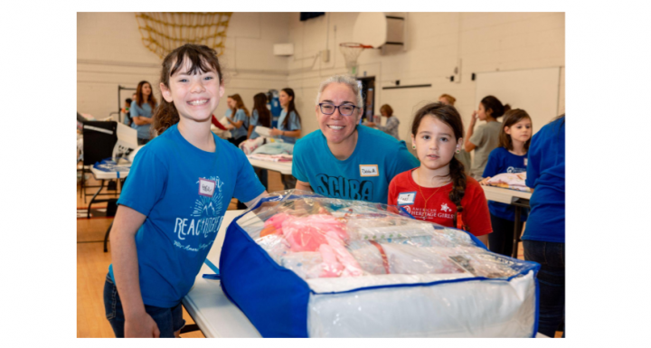 Community members participating in Sweet Dream packing event at the Community Resource Expo