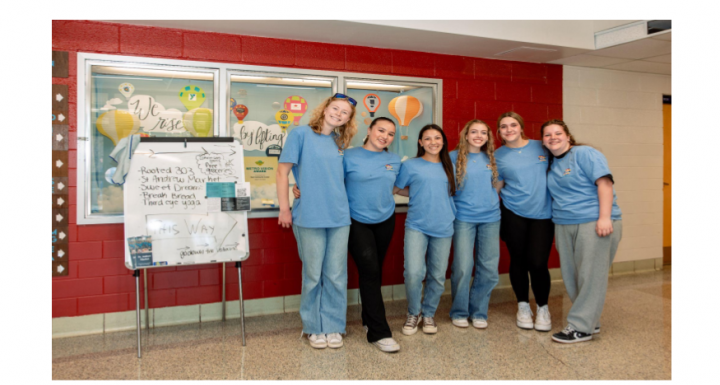 High school students volunteering at the Community Resource Expo